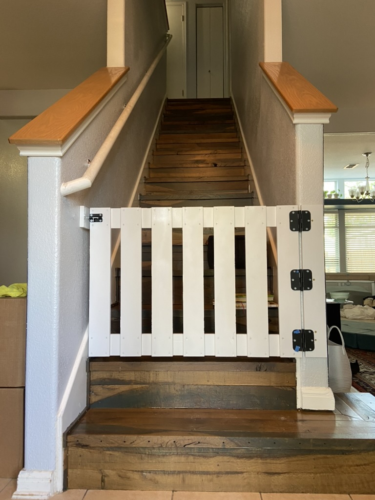 White Slat Baby Gate, wood, mounted across stairwell
